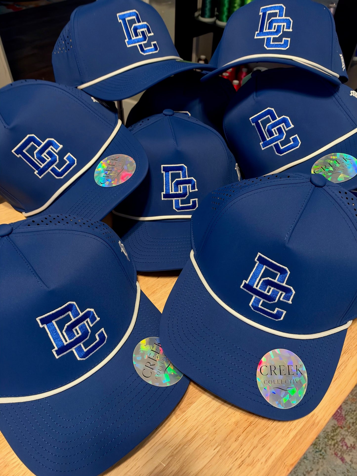 PRE-ORDER: DC-BRANDED BILLS- ROYAL-DC POM BOOSTER